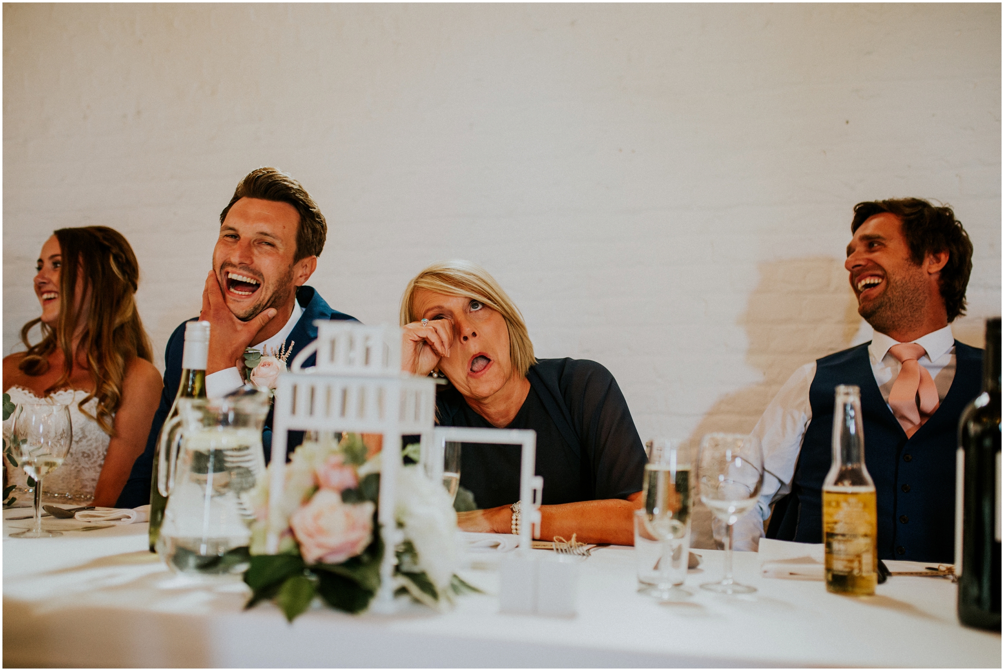 wedding top table laughing