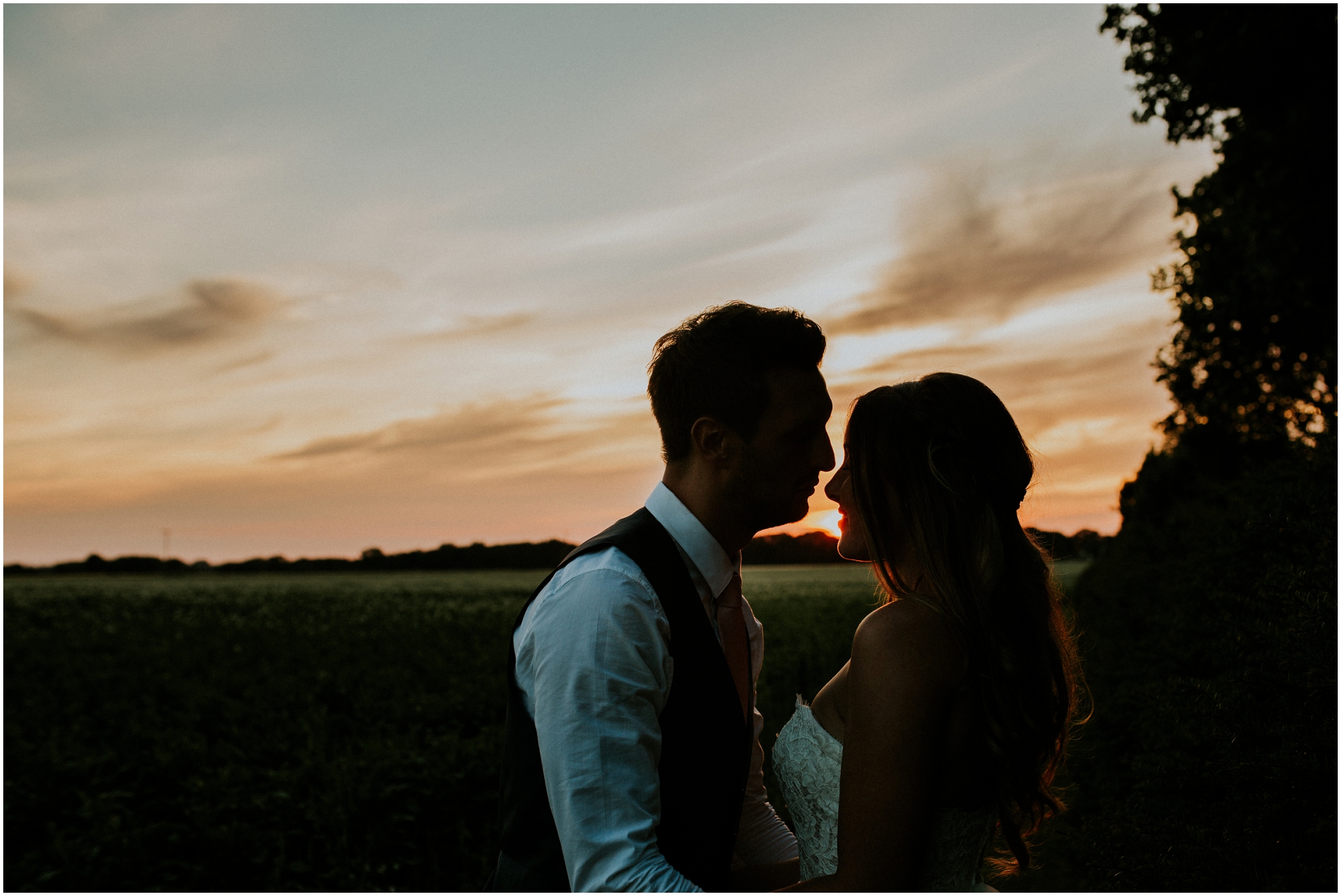 bride and groom during sunset