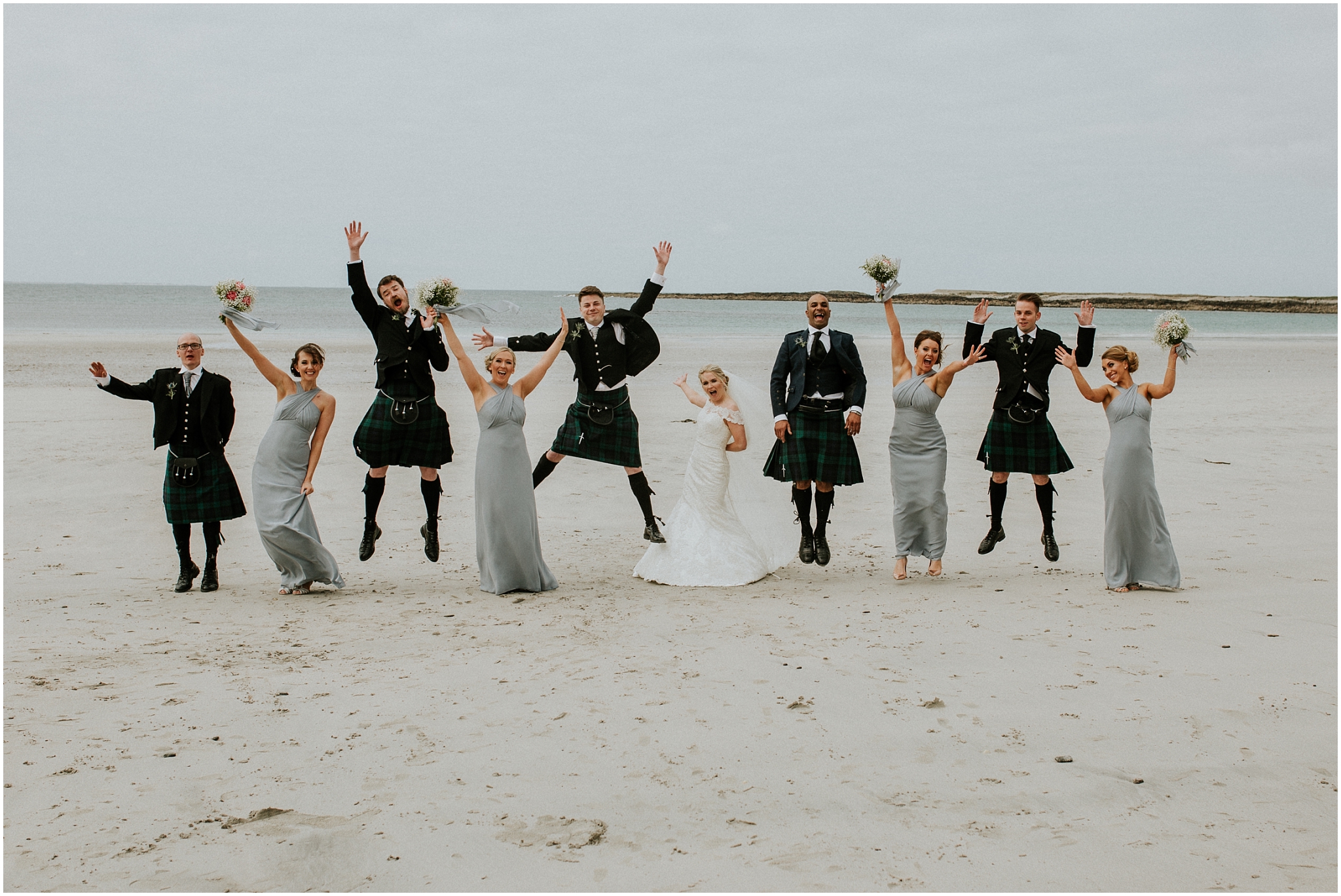 bridal party on the beach