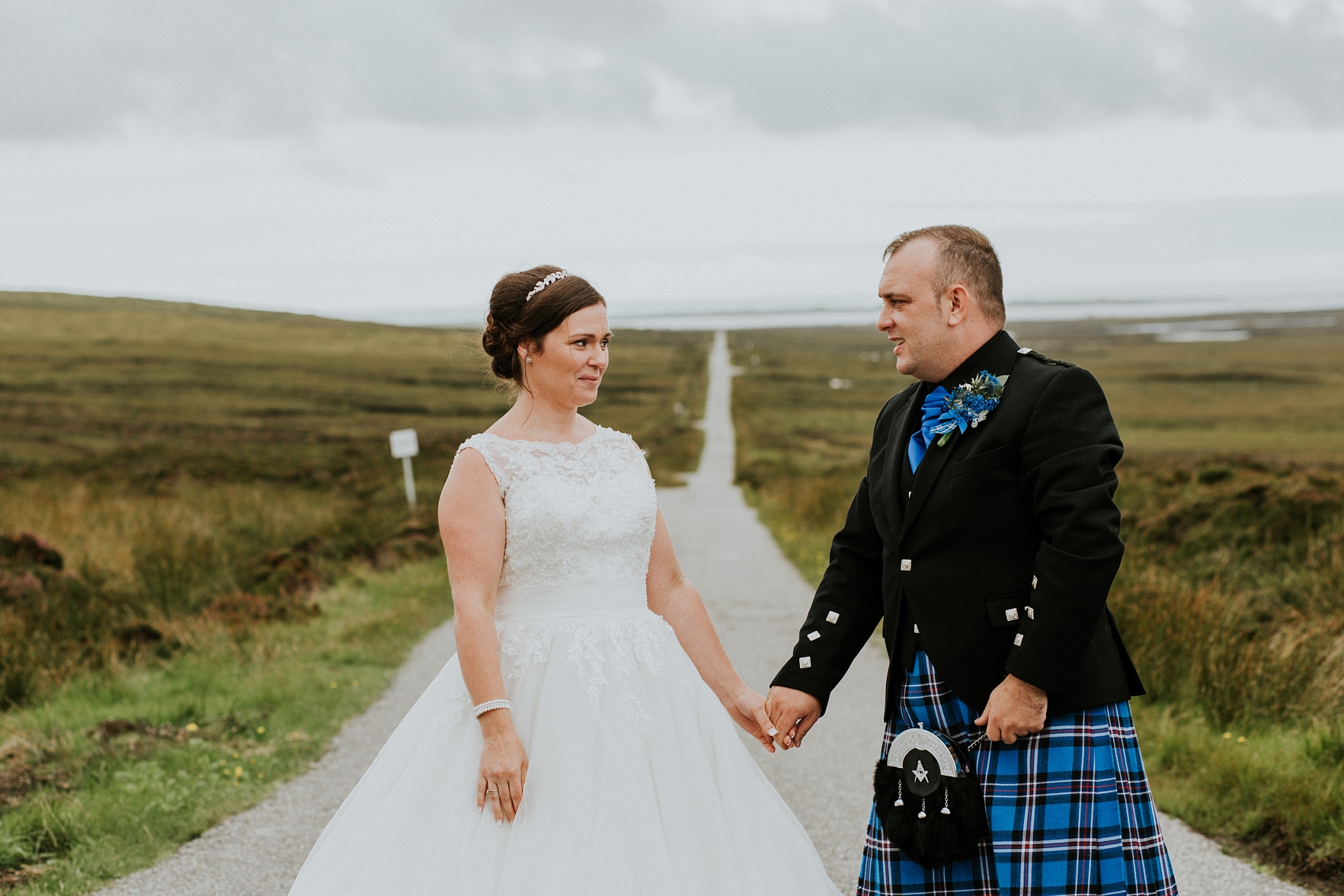 bride and groom looking at each other, solas road, north uist