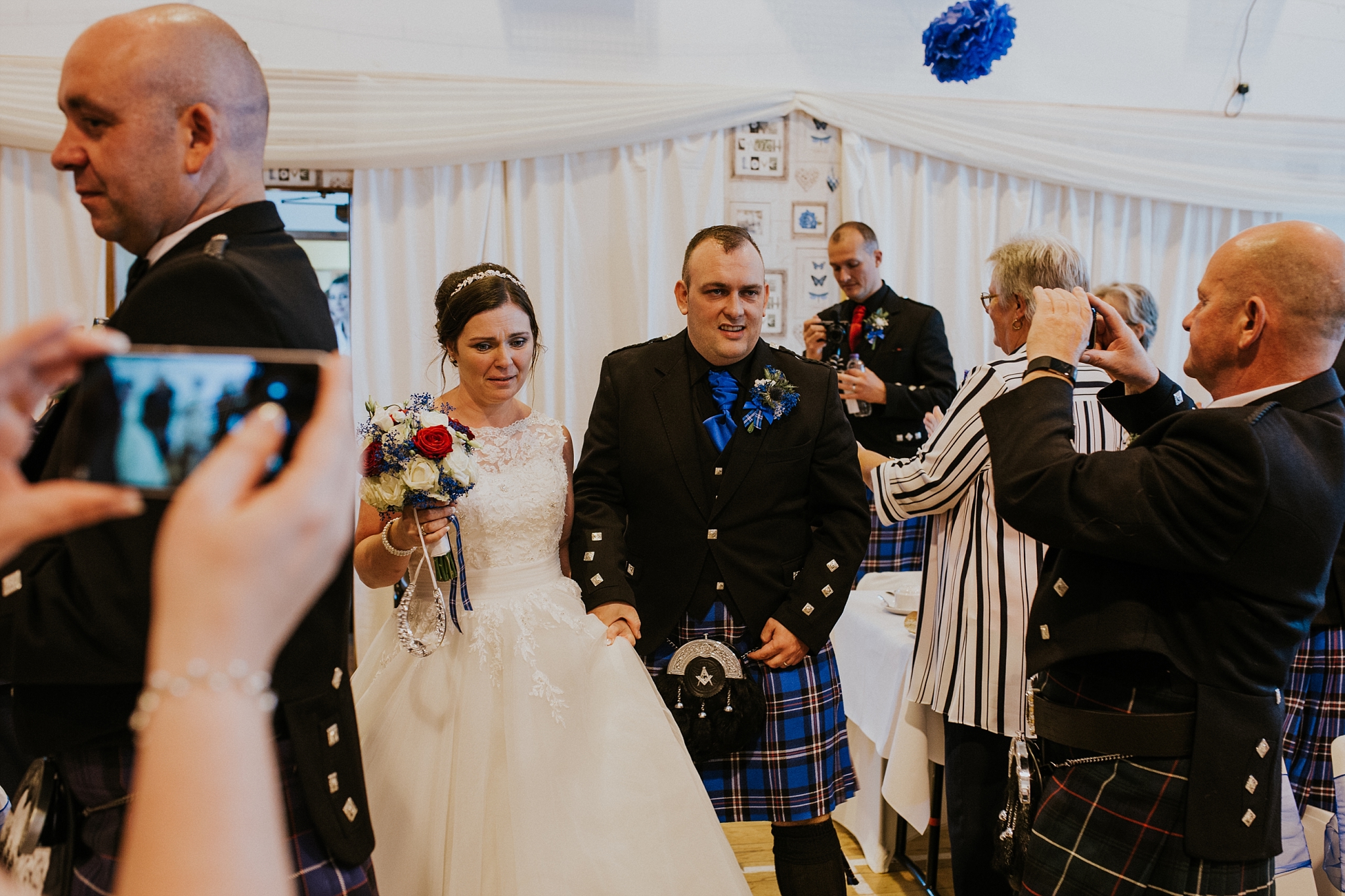 Bride and groom arrive at reception in Carnish Hall, North Uist